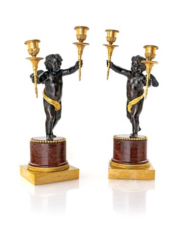  Coppia di doppieri in bronzo brunito e dorato, XIX secolo