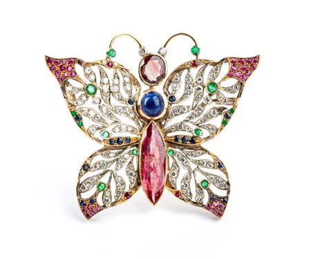  
Spilla farfalla in oro con diamanti e pietre di colore 
 