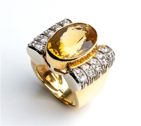  
Anello in oro con quarzo giallo 
 