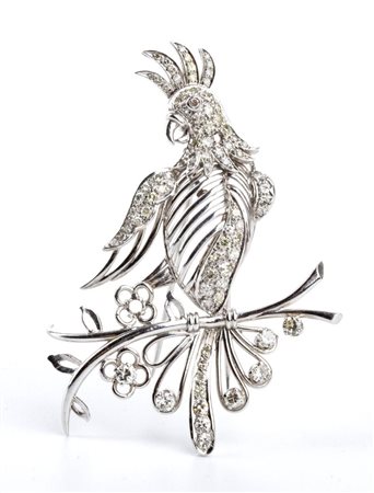  
Spilla in oro bianco e diamanti raffigurante un galletto 
 