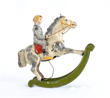  
Bambino su cavallo a dondolo 
 cm.30x30x20