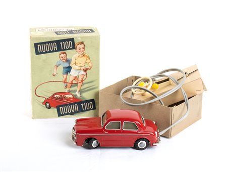  
DOMO Nuova 1100 (Fiat) in scatola 1950s
latta cm.19
