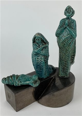 "Sacra Famiglia"
Gruppo in ceramica smaltata in verde, bruno e bianco su base s