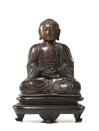 Scultura Cina, dinastia Ming sec. XVII, in bronzo raffigurante Buddha assiso,...