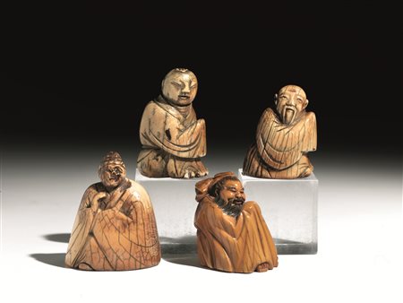 Tre Okimono, Giappone sec. XIX, in avorio, raffiguranti saggi, alt. cm 5,8;...
