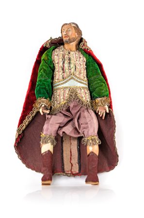 Figura maschile (paggio) con mantello in velluto rosso