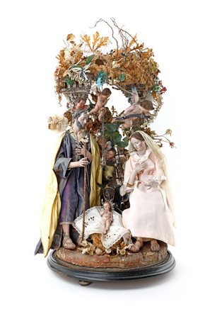 Gruppo della Natività composto da figure, animali e accessori con campana in vetro