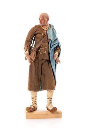 Rustico calvo con porro sulla fronte