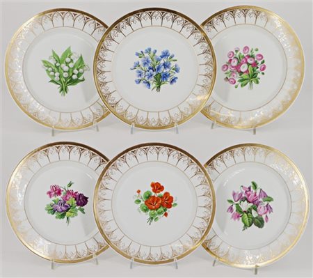 Manifatura KPM, Berlino, secolo XIX. Gruppo di sei piatti in porcellana decorat