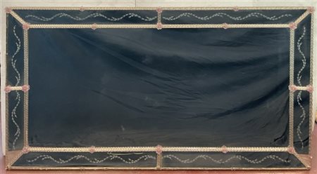 Manifattura di Murano del secolo XX. Grande specchiera con cornice a elementi i