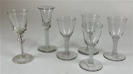 Manifattura del secolo XVIII-XIX. Gruppo di sei diversi calici in vetro soffiat