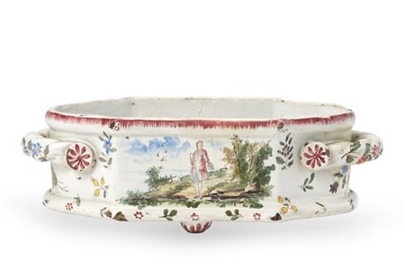 Manifattura di Moustier, secolo XVIII-XIX. Fioriera biansata in maiolica a prof