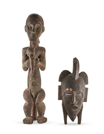 Arte africana. Lotto composto da una maschera ed una figura in legno (h. max cm