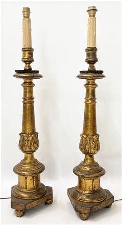 Coppia di torciere in legno intagliato e dorato, elettrificate in epoca posteri