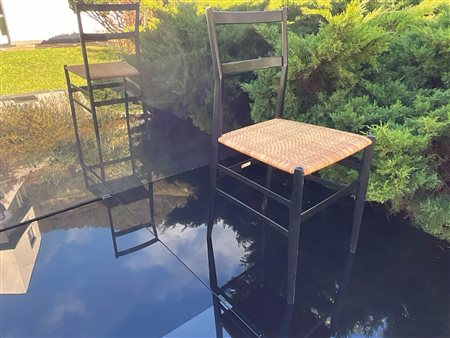 Giò Ponti Sedia "ultraleggera", 1951;Legno laccato nero, vimini, h. 82,5 x...