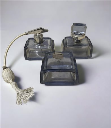  
Due flaconi e un vaporizzatore seconda metà Novecento
 massime 8 x 12 cm