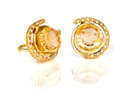 Coppia di orecchini in oro, topazi e brillanti