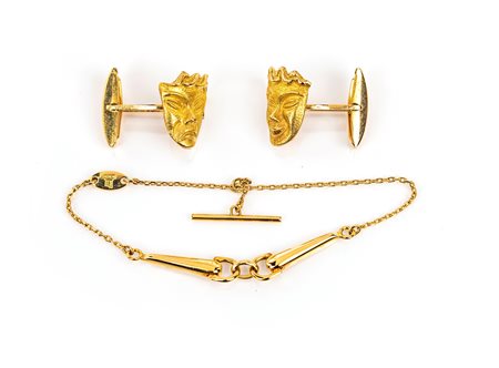 Coppia di gemelli e fermacravatta in oro