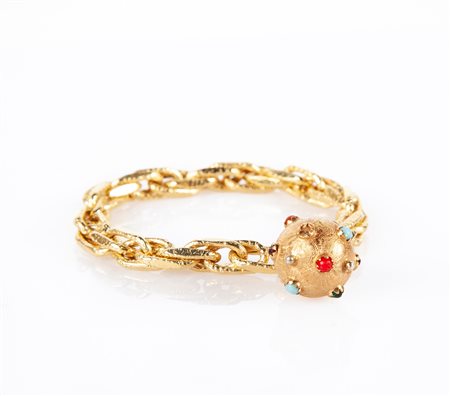 Bracciale in oro con pendente a forma di mina