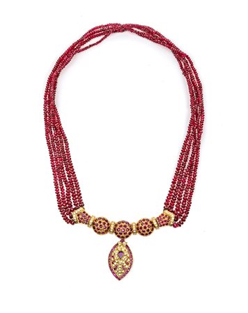 Collana in oro, rubini e brillanti