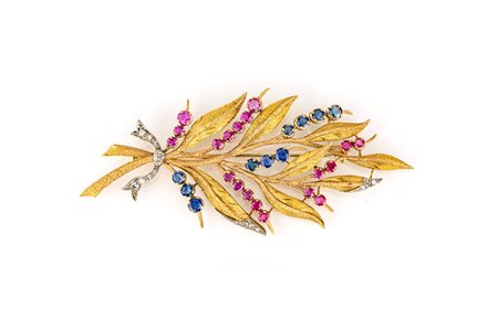 Spilla in oro, diamanti, zaffiri e rubini