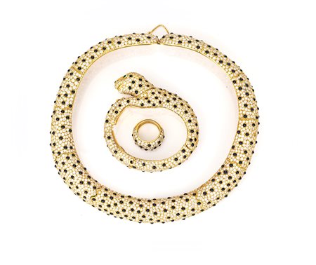 Parure a soggetto animalier di girocollo, bracciale ed anello in oro, brillanti ed onice