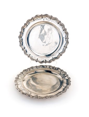 Quattro piatti in argento