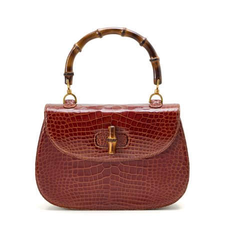 Vintage Gucci Bamboo in coccodrillo con metalleria dorata. Interno in...