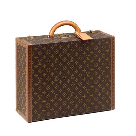Valigia Louis Vuitton rigida monogram con finiture in pelle. Interno colore...