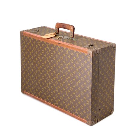 Valigia rigida Louis Vuitton monogram con finiture in pelle di vacchetta...
