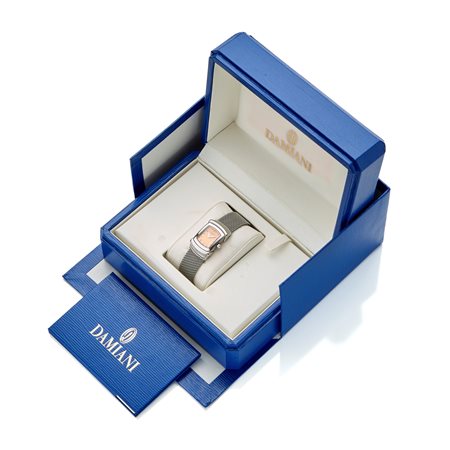 Damiani, 1999. Cassa in acciaio, bracciale con maglia milanese e deployante...