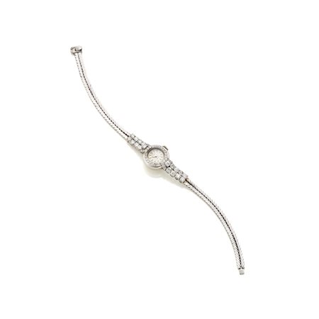 Orologio Rolex, anni '60, in oro bianco 18 Kt con diamanti rotondi per...