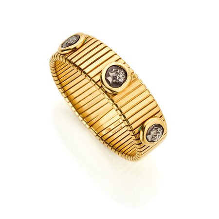 Bracciale tubogas Bulgari, collezione Monete, fine anni '80 circa, in oro...