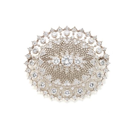 Spilla in oro bianco 18 Kt con diamanti rotondi per complessivi 5,40 ct circa...