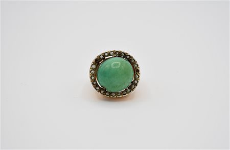 Anello in oro 750 con turchese centrale e pietre simulanti