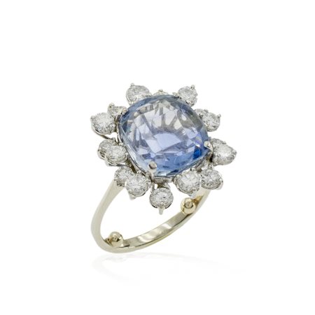 Anello in oro bianco 18kt con zaffiro naturale  peso 6 gr.