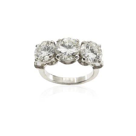 Anello trilogy in oro bianco 18kt  peso 7 gr.