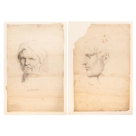 DUE DISEGNI CHE RITRAGGONO VOLTI MASCHILI