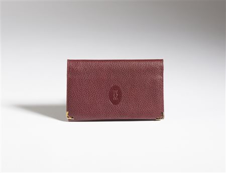 CARTIER - Portafoglio in pelle bordeaux.