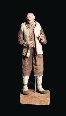 Figura da presepe in cartapesta e stoffa. Arte napoletana, XIX secolo. Cm...