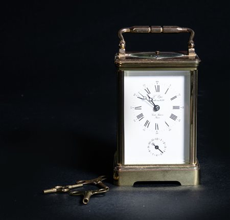 Orologio da viaggio. Con cassa in bronzo e vetro. Fine del XIX secolo - inizi...