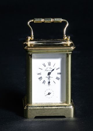 Orologio da viaggio. Con cassa in bronzo e vetro. Fine del XIX secolo - inizi...