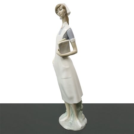 Lladrò (1956)  - Statuina porcellana di infermiera con uniforme bianca e blu