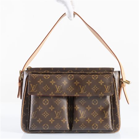 LOUIS VUITTON Borsa modello Vive la Cité in tela monogram. Reca due tasche...