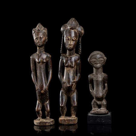  
TRE SCULTURE ANTROPOMORFE IN LEGNO 
 