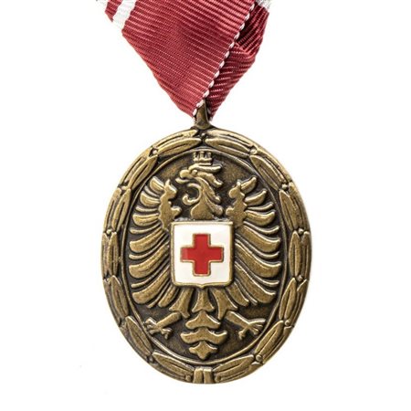  
MEDAGLIA AL MERITO DELLA CROCE ROSSA CROCE ROSSA - AUSTRIA...
BRONZO, 33,8X40 MM 