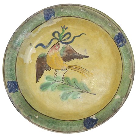 Piatto in maiolica di Caltagirone con raffiugrazione di uccello