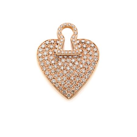  
Charm Faraone in oro e diamanti 
 