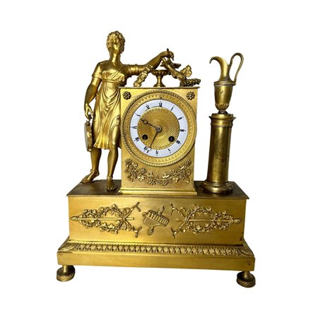 Orologio in bronzo dorato al mercurio, periodo Impero Francia XIX secolo....