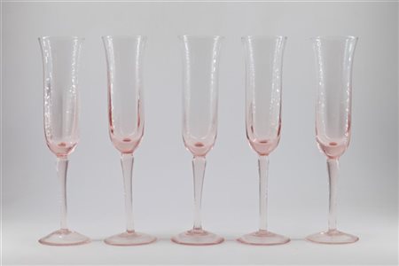 Lotto composto da circa centottanta flûte in vetro rosa, in quindici cartoni (d